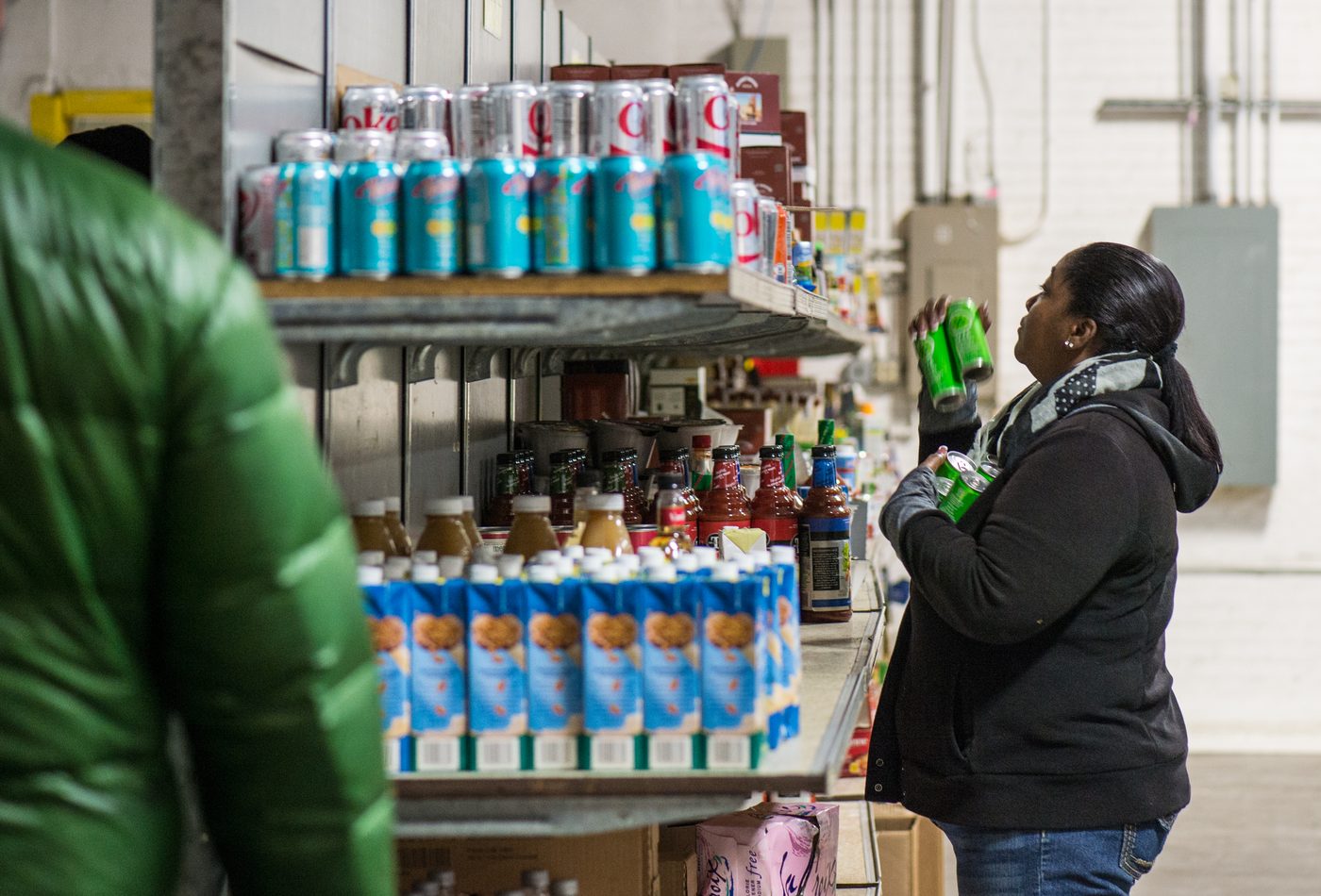 Food bank shelves stocked with groceries